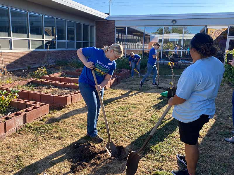 Zions employees doing outdoor community work